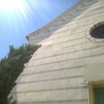 Vertical Dial on church in Porto Maurizio, Imperia, Italy showing Italian hours.